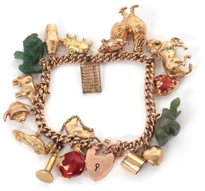 Lot 168 - A 9ct charm bracelet, the curblink bracelet...