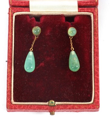 Lot 101 - A pair of early 20th century green stone...