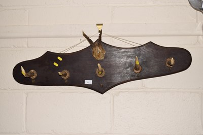 Lot 271 - A coat rack, the hooks formed from deer antlers