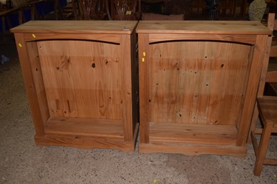 Lot 276 - A pair of pine open front bookcase cabinets