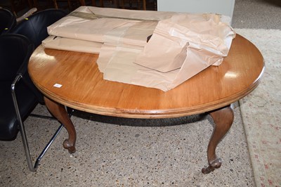 Lot 297 - An Edwardian oval mahogany extending dining...