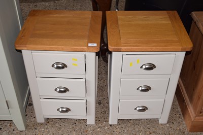 Lot 300 - A pair of modern oak topped bedside cabinets