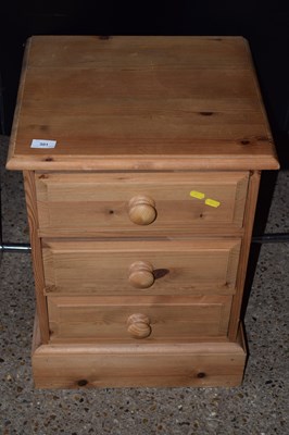 Lot 301 - Modern pine three drawer bedside cabinet