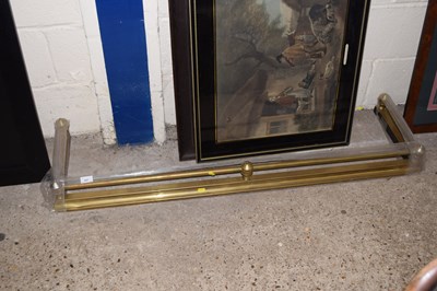 Lot 337 - A brass fire curb