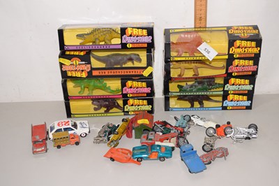 Lot 536 - Model dinosaurs, boxed and toy cars, play worn