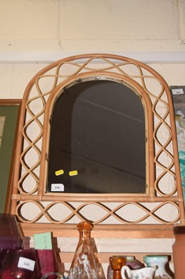 Lot 539 - A bamboo framed arched wall mirror