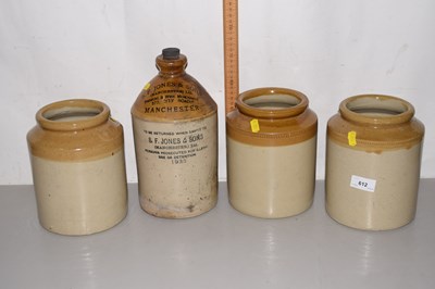 Lot 612 - A stone ware bottle and three stone ware jars