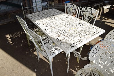 Lot 405 - Four cast metal garden chairs together with a...