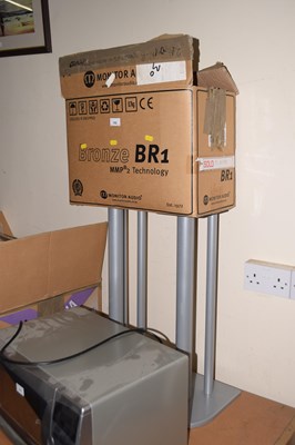 Lot 702 - A pair of speaker stands and speaker