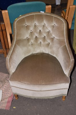 Lot 773 - A button backed upholstered tub chair