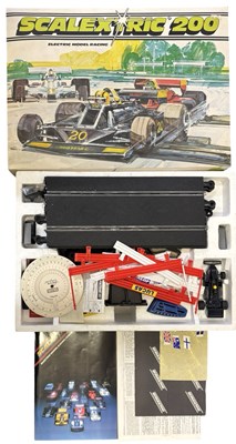 Lot 435 - A vintage Scalextric 200 electronic racing set...