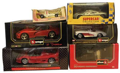 Lot 193 - A collection of various boxed racing cars, to...