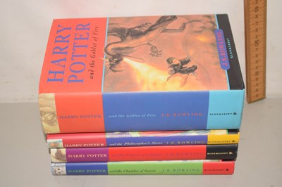 Lot 40 - A group of four Harry Potter books