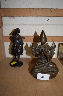 Lot 82 - A small 20th Century bronze model of a Buddha...