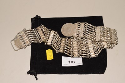 Lot 107 - A Middle Eastern white metal coin set necklace...