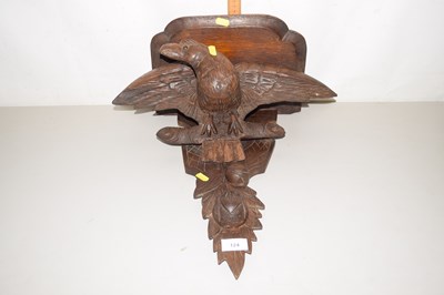 Lot 124 - Black Forest type wall bracket decorated with...