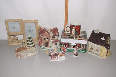 Lot 178 - A group of modern porcelain model cottages,...