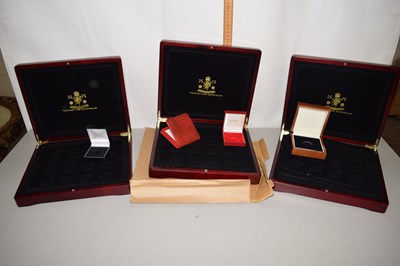 Lot 186 - A collection of various empty coin display...