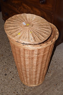 Lot 212 - A wicker laundry bin