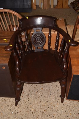 Lot 242 - A Victorian elm seated Captains chair