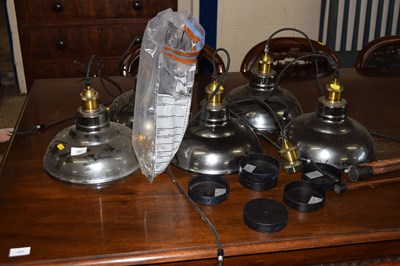 Lot 301 - A set of five vintage tinted glass shop lights...