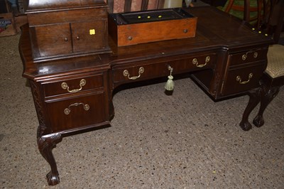 Lot 255 - Reproduction mahogany leather topped desk by...
