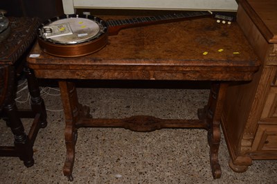 Lot 262 - A Victorian walnut veneered card table