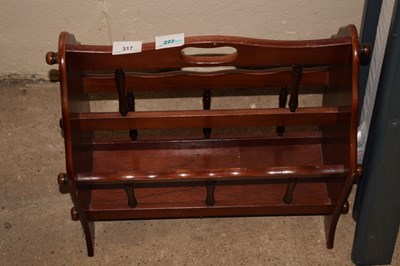 Lot 317 - A magazine rack