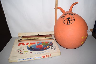 Lot 525 - A vintage space hopper together with Risk...