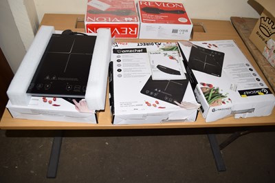 Lot 654 - Three boxed single induction cookers