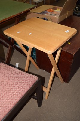 Lot 671 - A folding side table