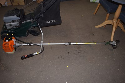Lot 674 - A petrol brush cutter