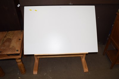 Lot 717 - A child's adjustable drawing board