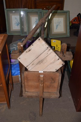 Lot 719 - A vintage wood and iron press