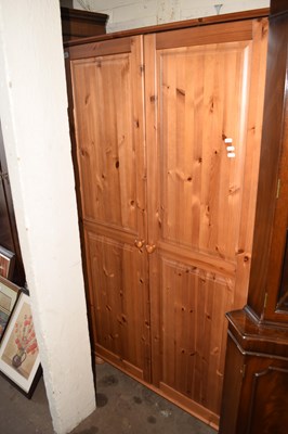 Lot 743 - A modern pine double door wardrobe