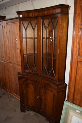 Lot 744 - Reproduction mahogany veneered concave floor...