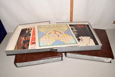 Lot 616 - Three brown padded cases of various records to...