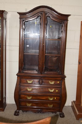 Lot 224 - A reproduction hardwood display cabinet with...
