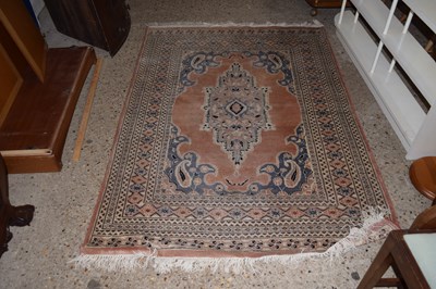 Lot 226 - A 20th Century patterned floor rug
