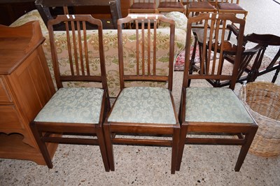 Lot 245 - A set of three Edwardian mahogany dining chairs
