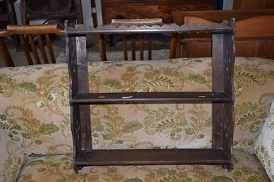 Lot 249 - A small oak wall shelf