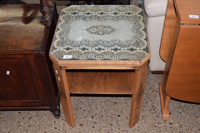 Lot 262 - A retro glass topped coffee table