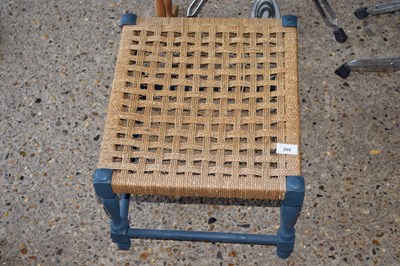 Lot 288 - A sizal covered footstool