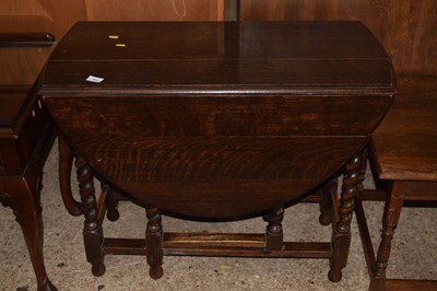 Lot 304 - Drop leaf table  on barley twist legs