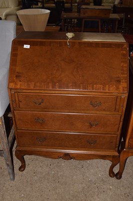 Lot 313 - 20th Century walnut veneered three drawer bureau