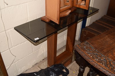 Lot 321 - A modern side table with smoked glass top
