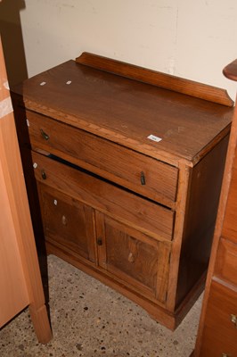 Lot 324 - Small early 20th Century oak two door, two...