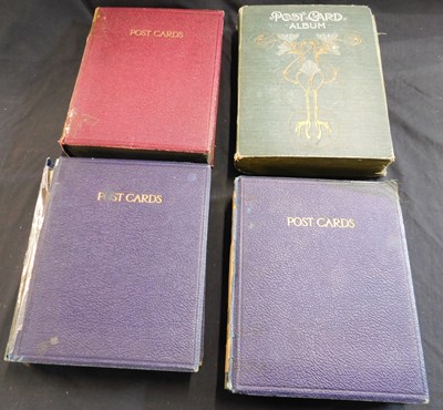 Lot 443 - Four old postcard albums containing circa 800...