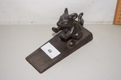 Lot 46 - A metal door stop modelled as a mouse