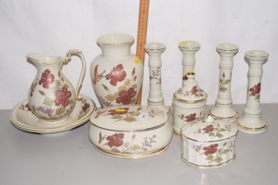 Lot 141 - A Fapodel set of floral pattern candlesticks,...
